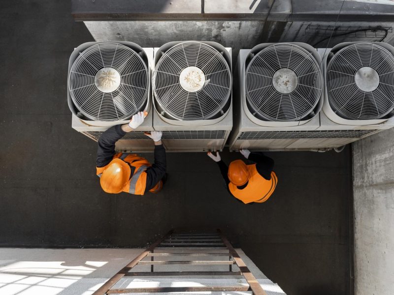 men-working-with-equipment-full-shot men-working-with-equipment-full-shot